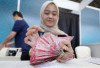 Terjebak FOMO dan YOLO, Banyak Gen Z Pilih ‘Check Out Duluan, Bayar Belakangan’